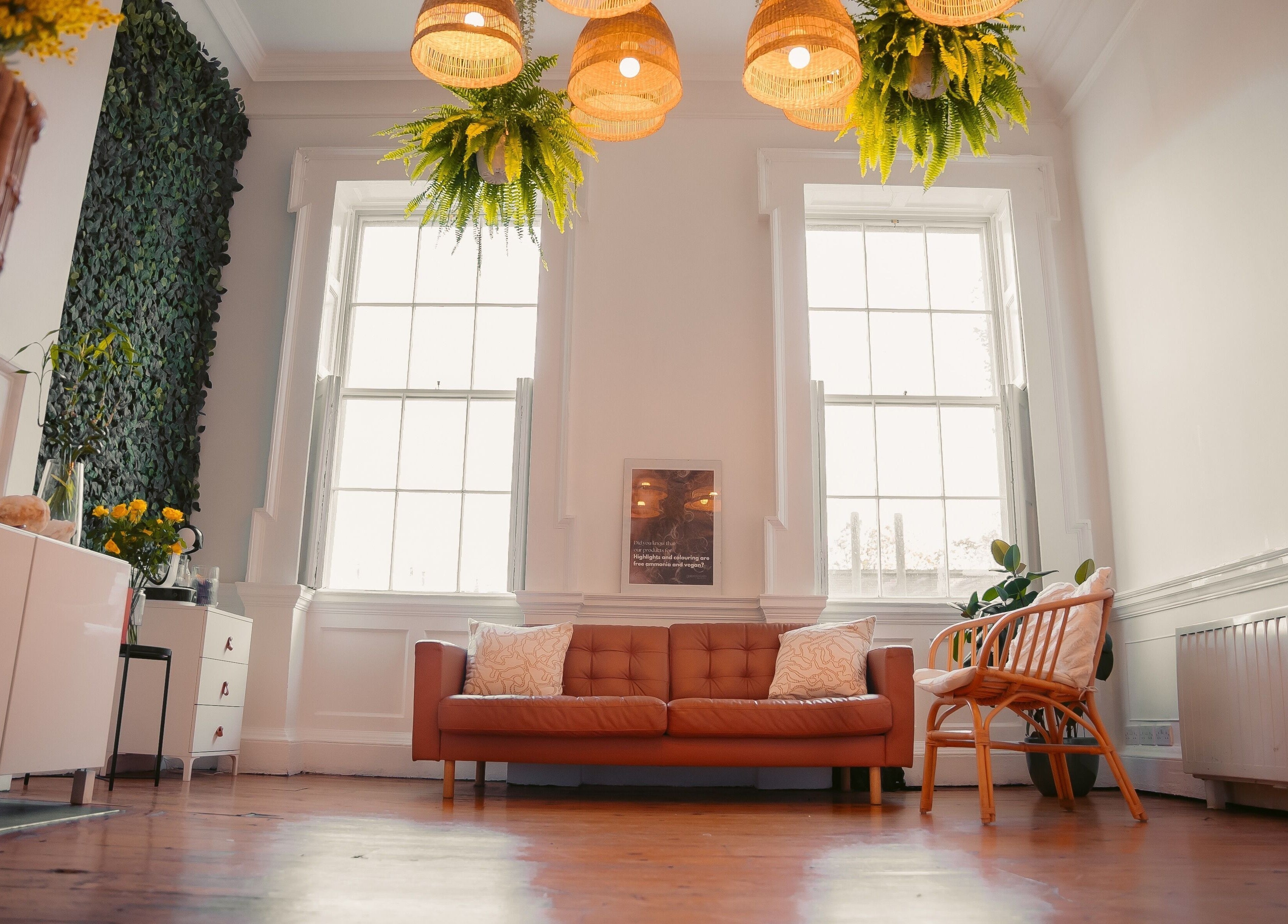Inviting interior of Gabriela Leite Curly Hair Salon in Dublin, County Dublin, IE with cozy seating and greenery.