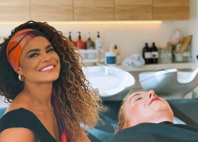 Client enjoying a treatment at Gabriela Leite Curly Hair Salon, Dublin, County Dublin, IE.