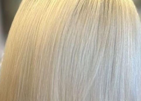 Sleek blonde hairstyle at Salon Seven in Wivenhoe, England, GB. Perfect for modern elegance and style.