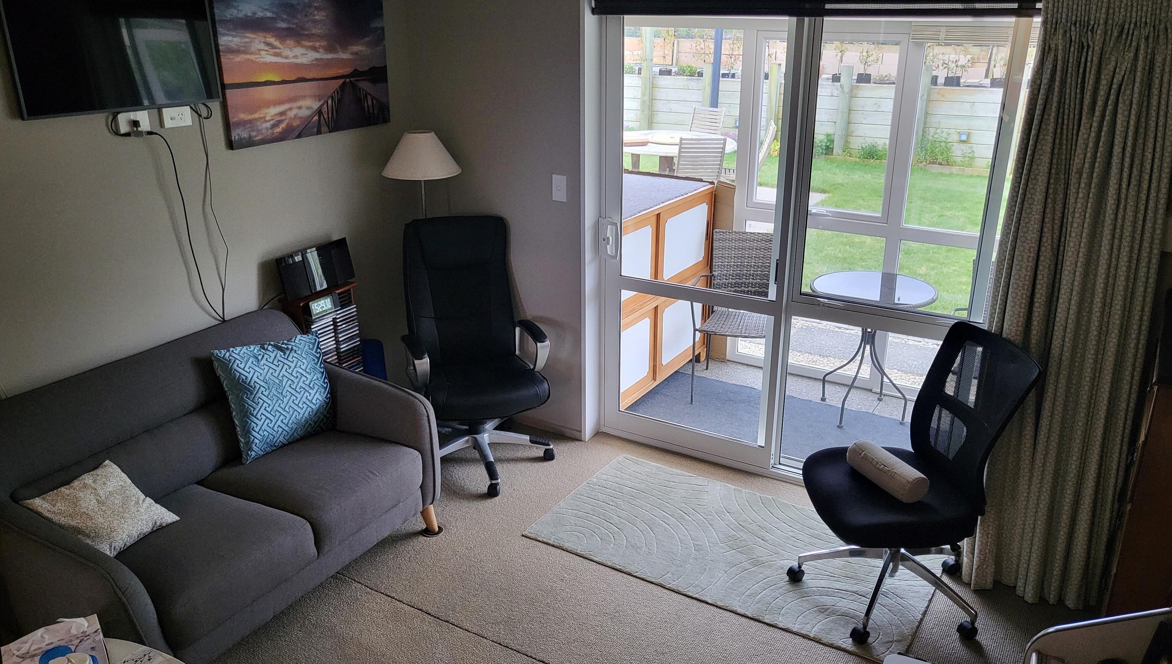 Inviting lounge area at Dr Derek Patton, Amberley, North Canterbury, NZ with modern furnishings and natural light.