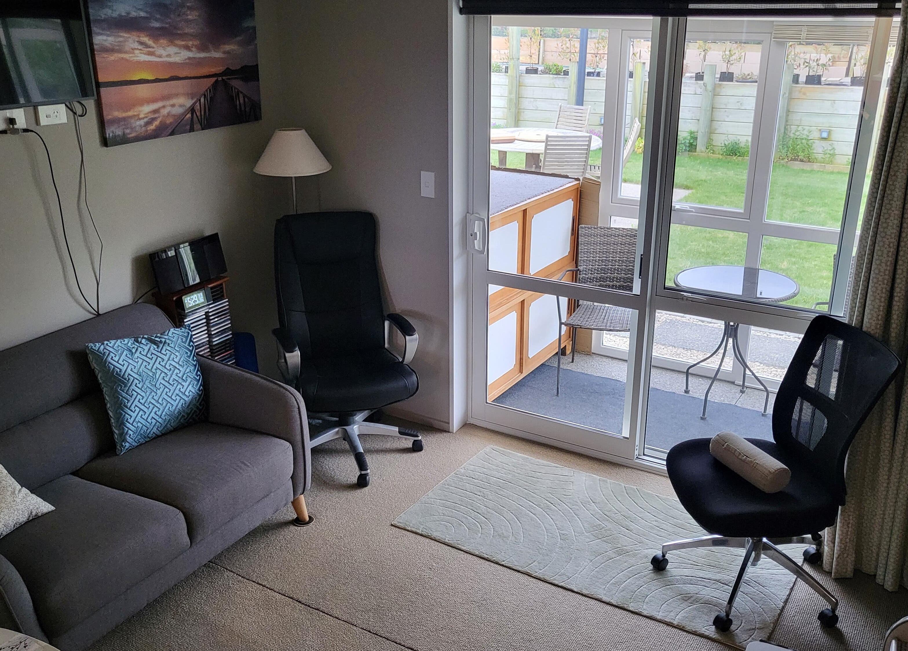 Inviting lounge area at Dr Derek Patton, Amberley, North Canterbury, NZ with modern furnishings and natural light.