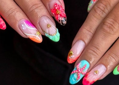 Bright, intricate nail art design at Gloss & Glo, Paisley, Scotland, GB showcasing vibrant creativity.