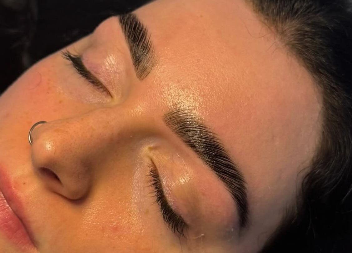 Close-up of eyebrow treatment at Gloss & Glo, Paisley, Scotland, GB, showcasing professional beauty care.