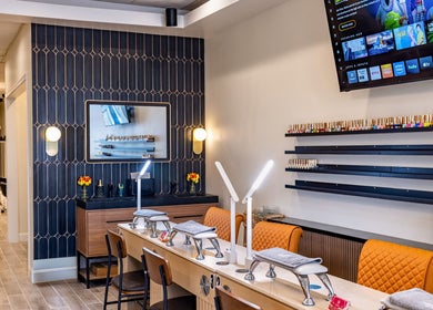 Modern nail service area at Mademoiselle Nails & Spa - Worcester in Worcester, Massachusetts, US.