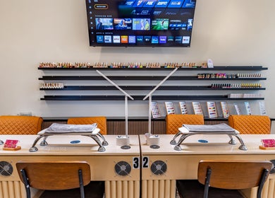 Nail stations at Mademoiselle Nails & Spa - Worcester offering a chic ambiance in Worcester, Massachusetts, US.