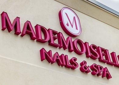 Mademoiselle Nails & Spa - Worcester signage in bold red letters, Worcester, Massachusetts, US.