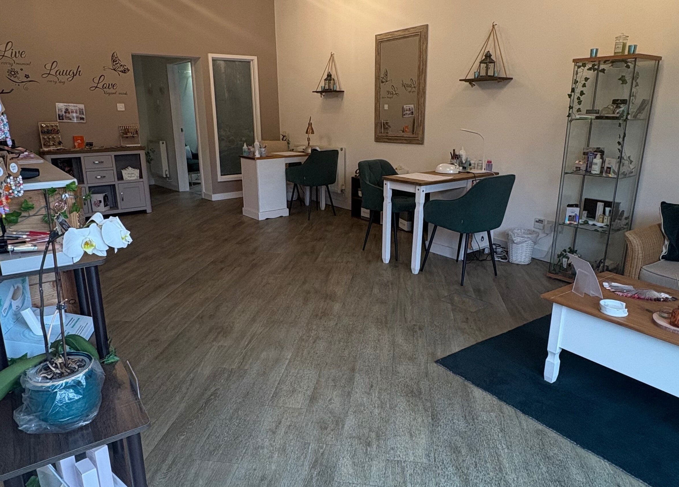 Interior of Midsomer Beauty Salon Ltd, Chilcompton, England, GB, showcasing a cozy and elegant salon space.