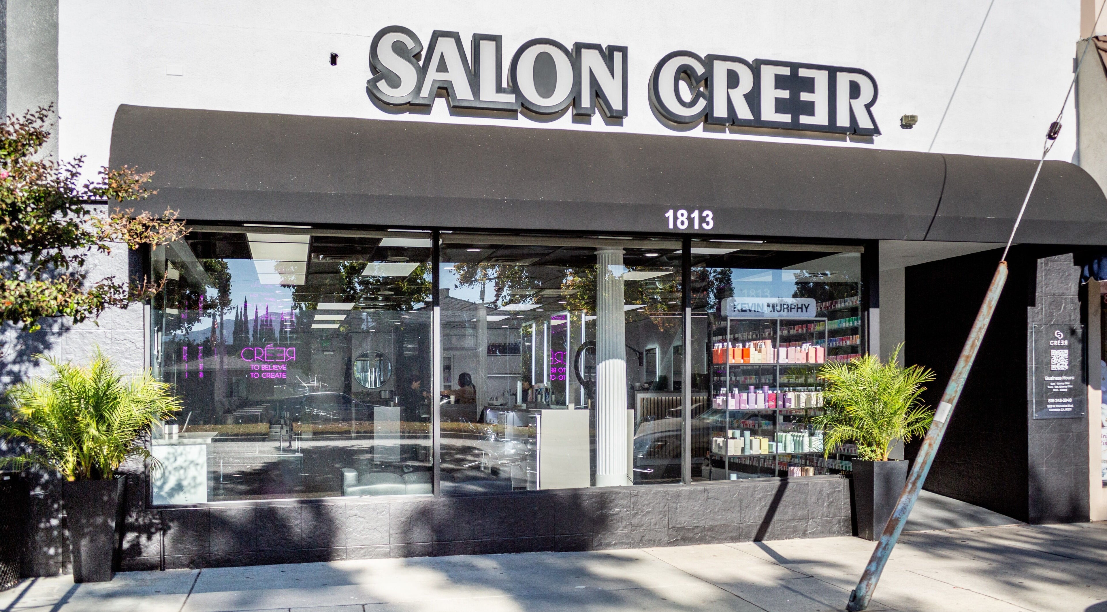 Front view of Salon Creer & Spa in Glendale, California, showcasing stylish design and product display.