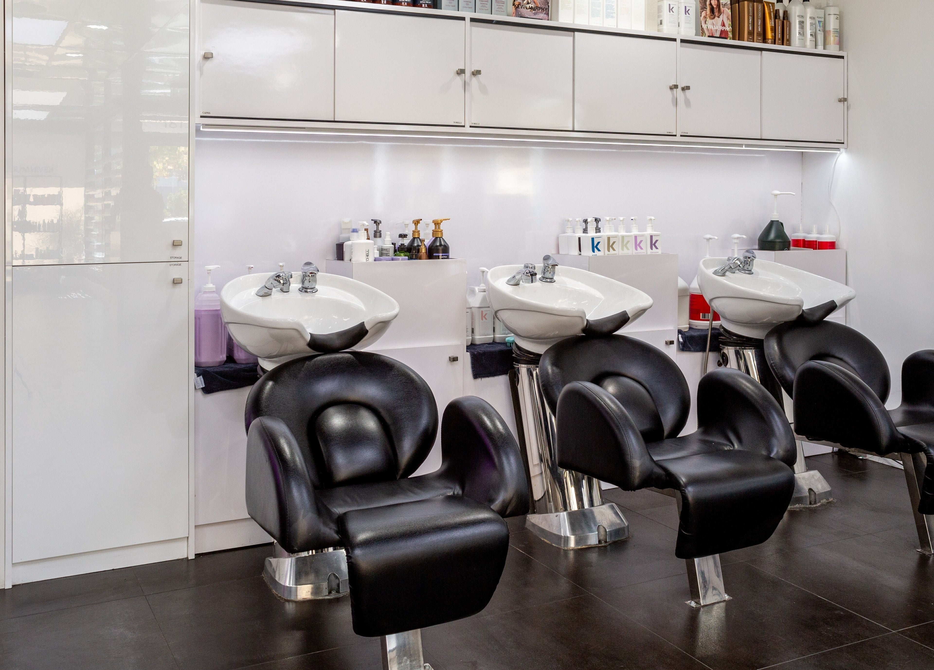 Modern wash stations at Salon Creer & Spa, Glendale, California, US, designed for a luxurious hair care experience.