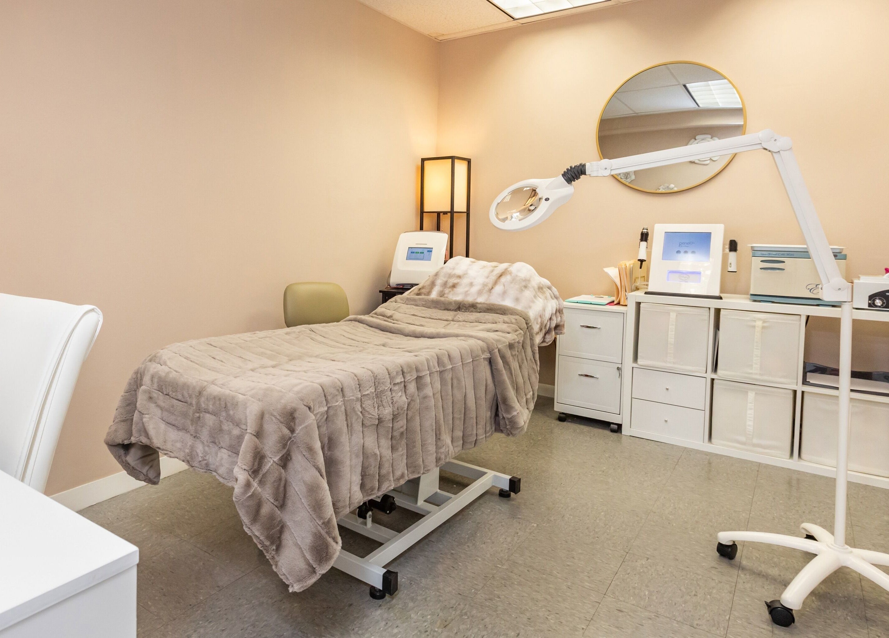 Cozy treatment bed at Lyla Beauty Bar Acton, Acton, Massachusetts, US, offering relaxing wellness services.