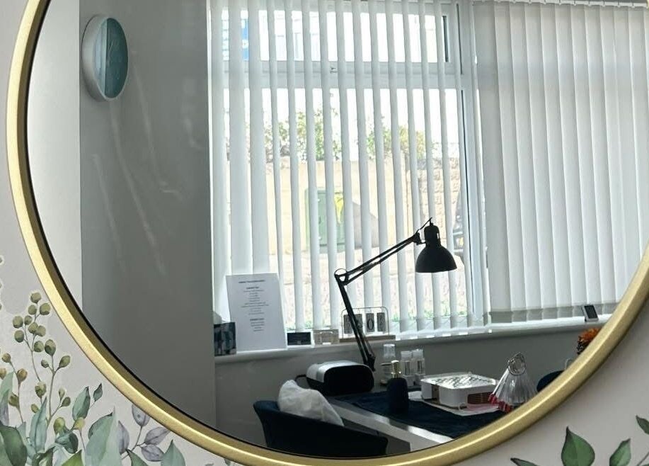Elegant beauty room mirror reflecting a serene setting at Polished and Pampered by Jen, Herne Bay, England, GB.