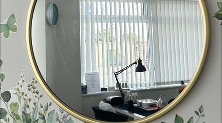 Elegant beauty room mirror reflecting a serene setting at Polished and Pampered by Jen, Herne Bay, England, GB.