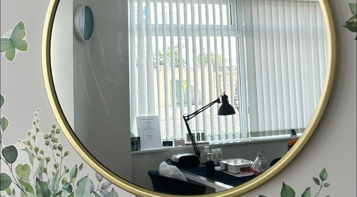 Elegant beauty room mirror reflecting a serene setting at Polished and Pampered by Jen, Herne Bay, England, GB.