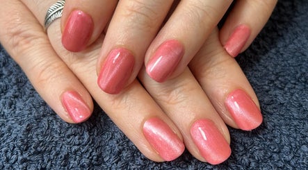 Elegant rosy nails by Polished and Pampered by Jen, Herne Bay, England, GB on a soft towel.