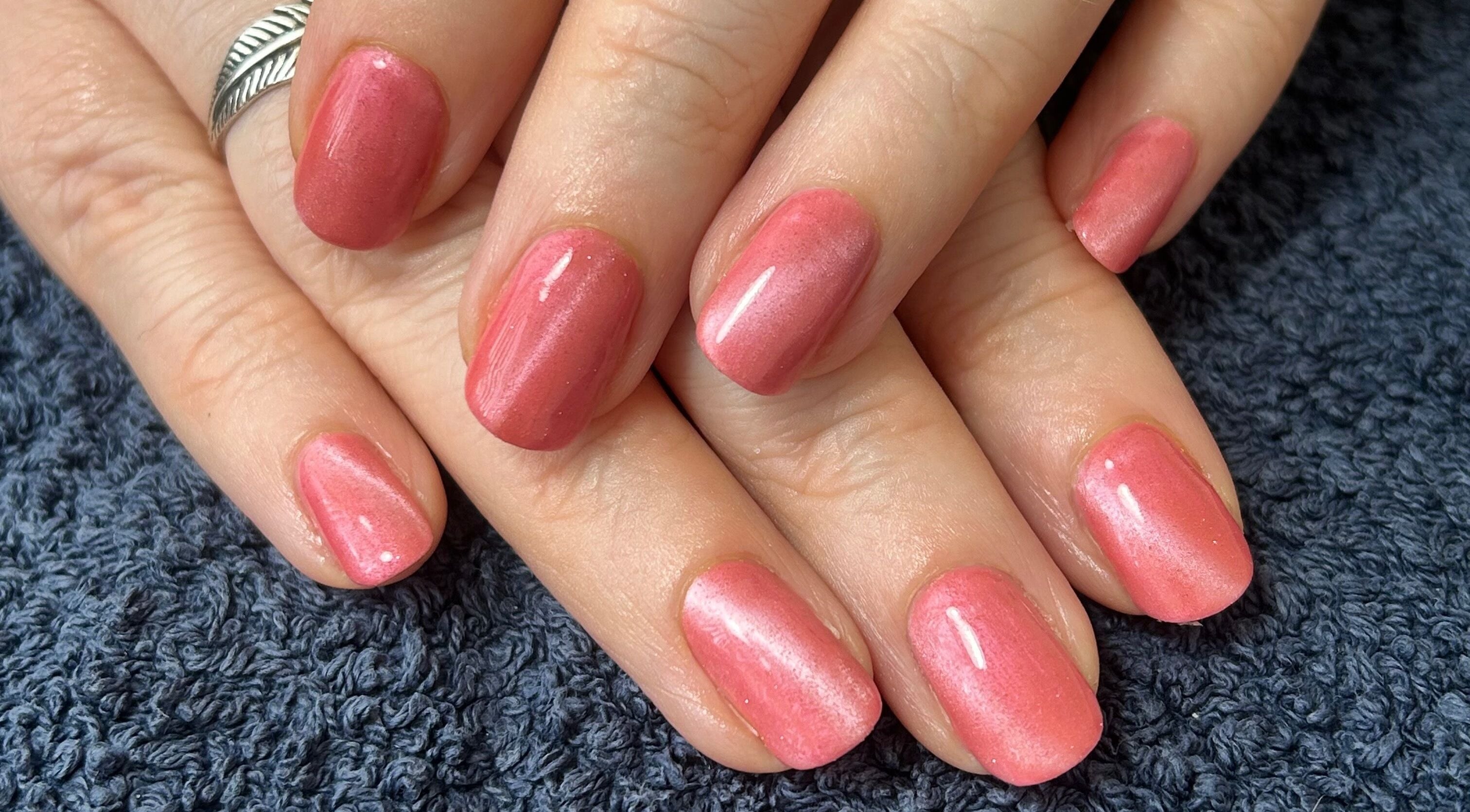 Elegant rosy nails by Polished and Pampered by Jen, Herne Bay, England, GB on a soft towel.