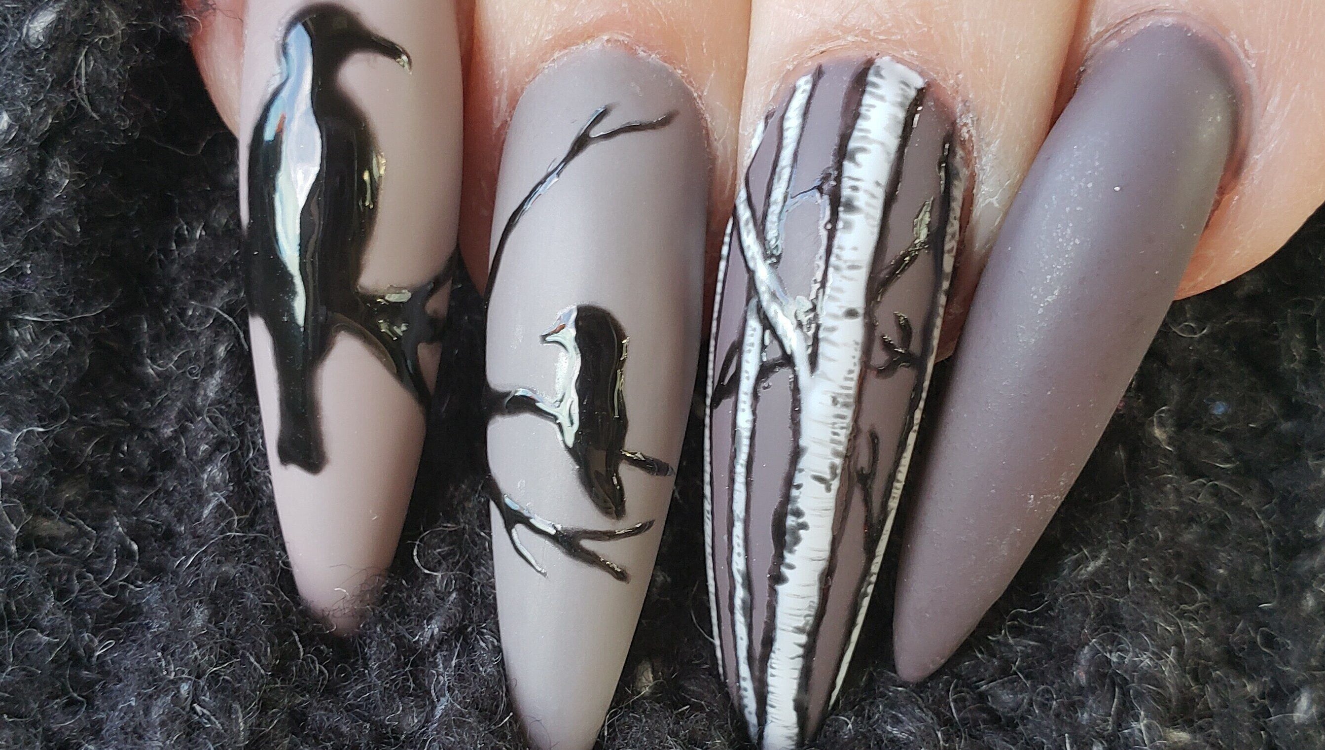 Elegant bird-themed nail art at Sondra’s Nails and Esthetics in Lethbridge, Alberta, CA.