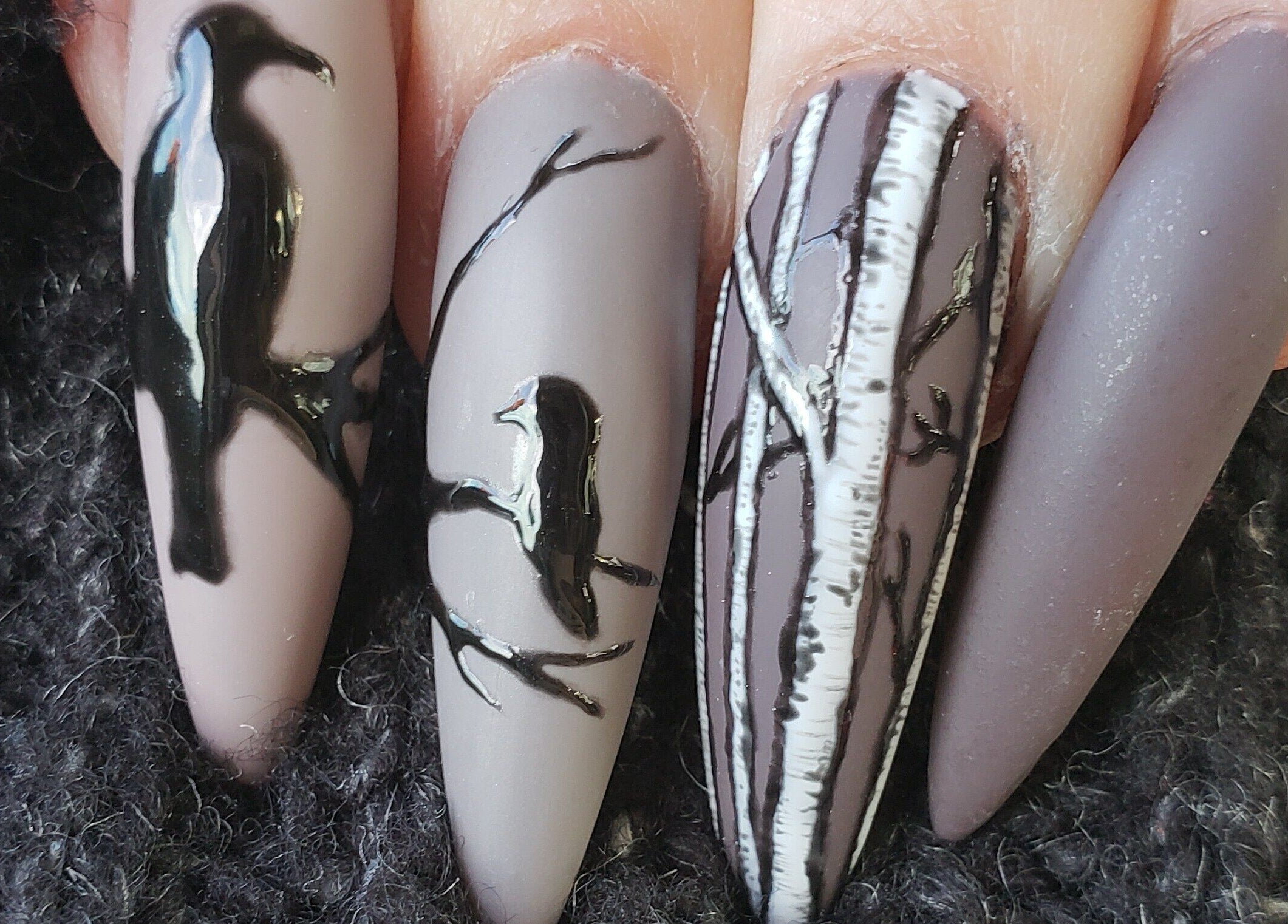 Elegant bird-themed nail art at Sondra’s Nails and Esthetics in Lethbridge, Alberta, CA.