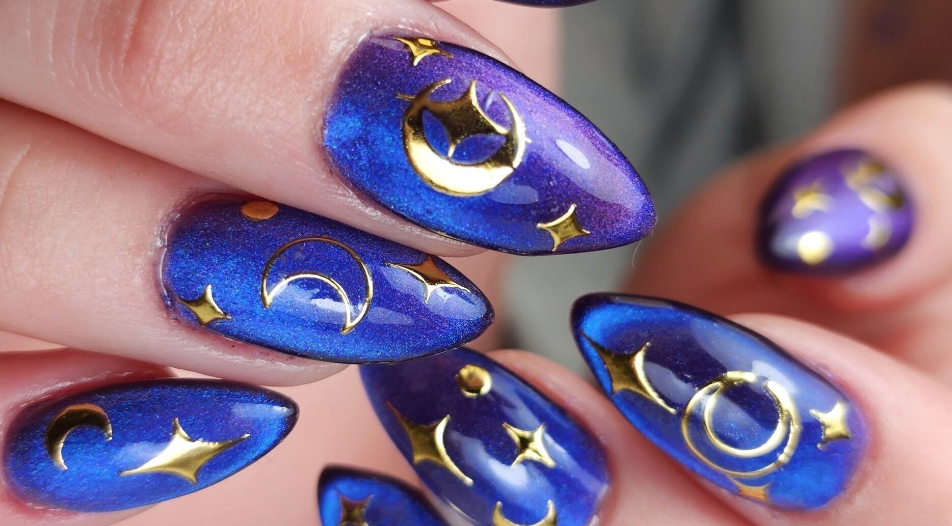 Stunning celestial nail art at Sondra's Nails and Esthetics, Lethbridge, Alberta, CA.