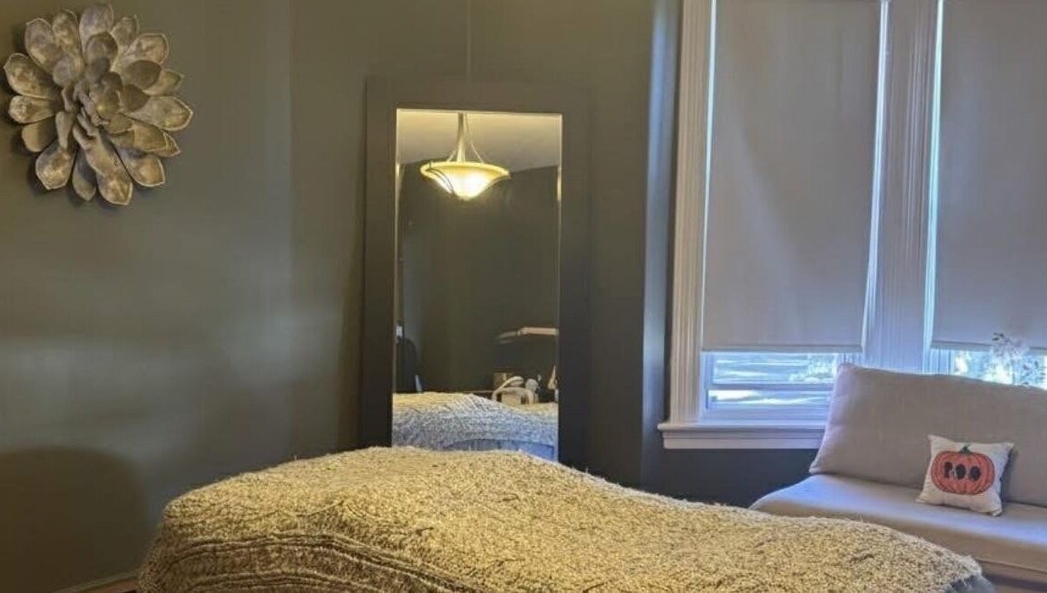 Quiet treatment room in Damaris Spa and Wellness Centre, Amherst, Nova Scotia, CA, featuring elegant decor.