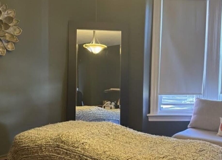 Quiet treatment room in Damaris Spa and Wellness Centre, Amherst, Nova Scotia, CA, featuring elegant decor.