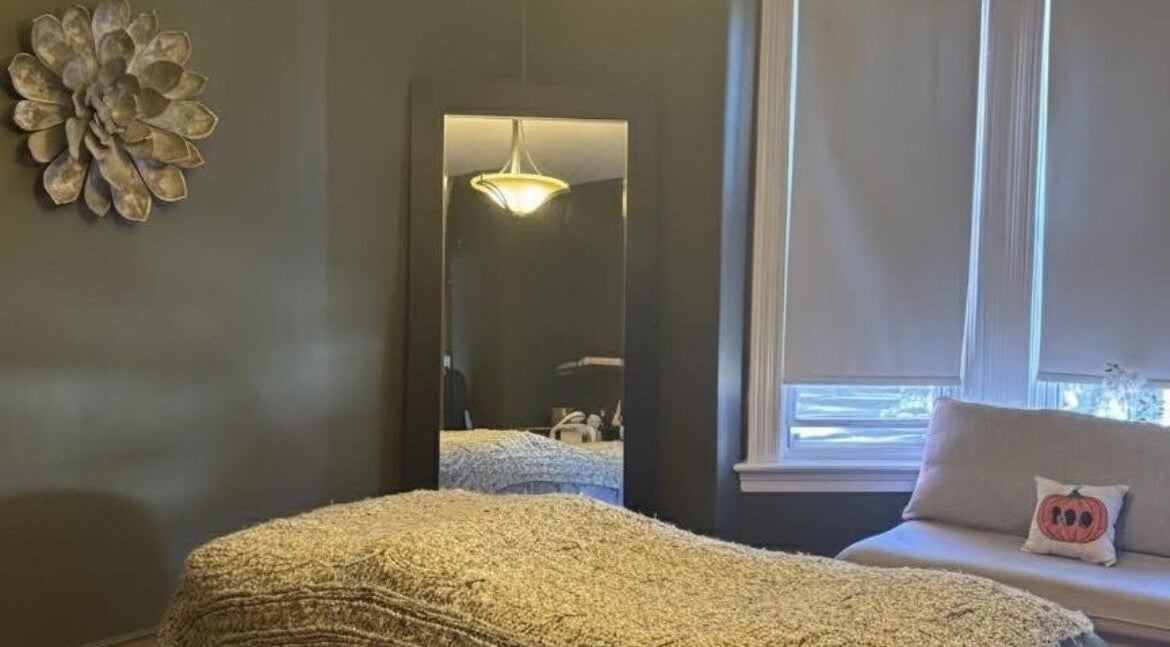 Quiet treatment room in Damaris Spa and Wellness Centre, Amherst, Nova Scotia, CA, featuring elegant decor.