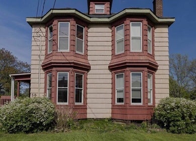Front view of Damaris Spa and Wellness Centre in a charming Victorian building, Amherst, Nova Scotia, CA.