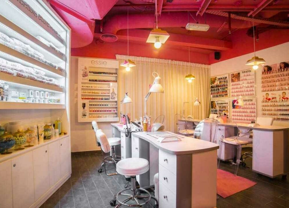 Nail salon interior at The 1978 Suite, Dubai, Dubai, AE with vibrant decor and personalized stations.