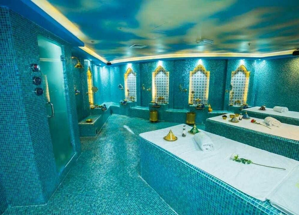 Luxurious spa room with turquoise tiles at The 1978 Suite in Dubai, Dubai, AE.
