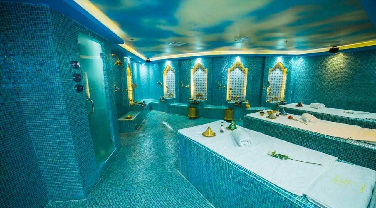 Luxurious spa room with turquoise tiles at The 1978 Suite in Dubai, Dubai, AE.