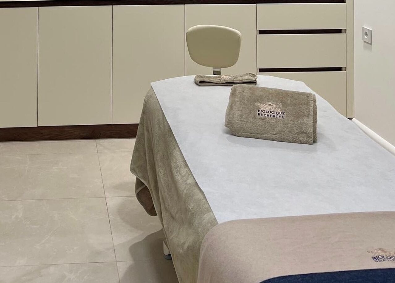 Tranquil treatment room at Advanced Aesthetics, Birkenhead, England, GB, showcasing modern elegance.