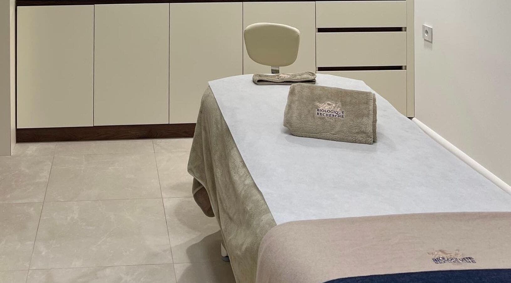 Tranquil treatment room at Advanced Aesthetics, Birkenhead, England, GB, showcasing modern elegance.