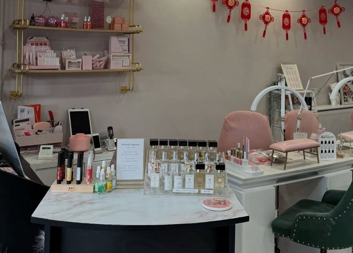 Elegant counter at Kaycie Kyle Brislington Salon displaying beauty products, Bristol, England, GB.