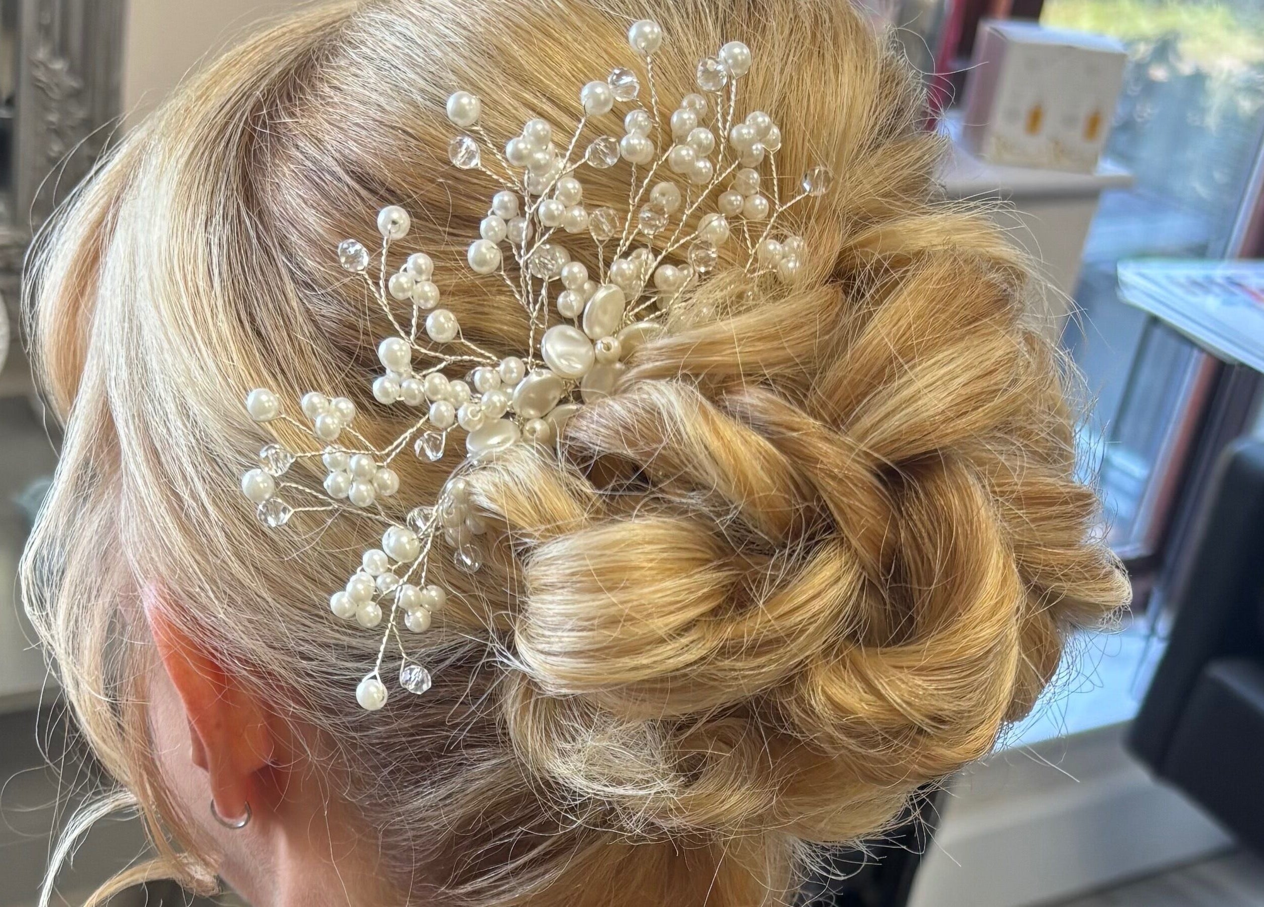 Elegant bridal hairstyle with pearl accents at Serene Spa, Barnard Castle, England, GB, showcasing salon expertise.