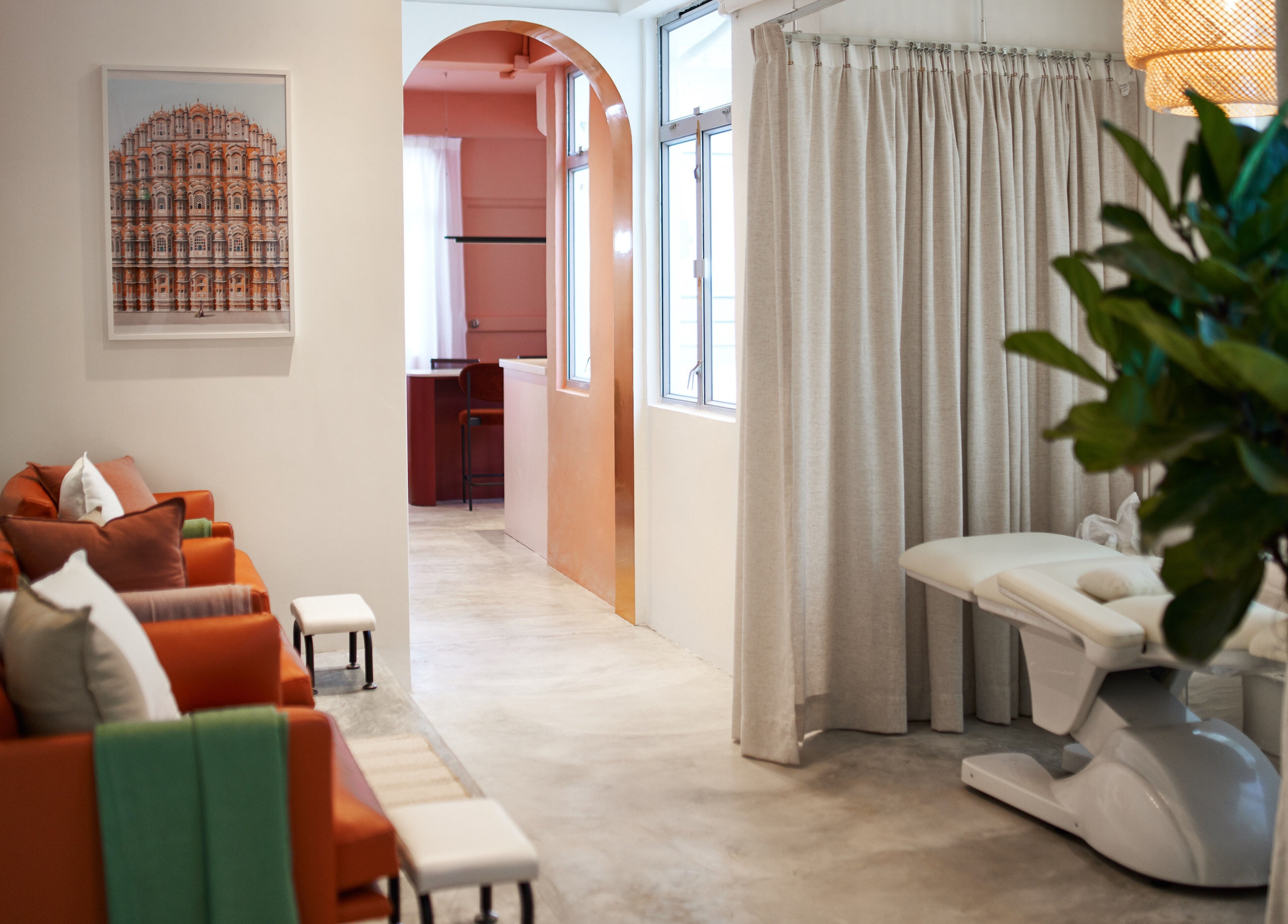 Relaxation area in Tinted. - Causeway Bay, Hong Kong Island, HK. Cozy seating and a massage table.