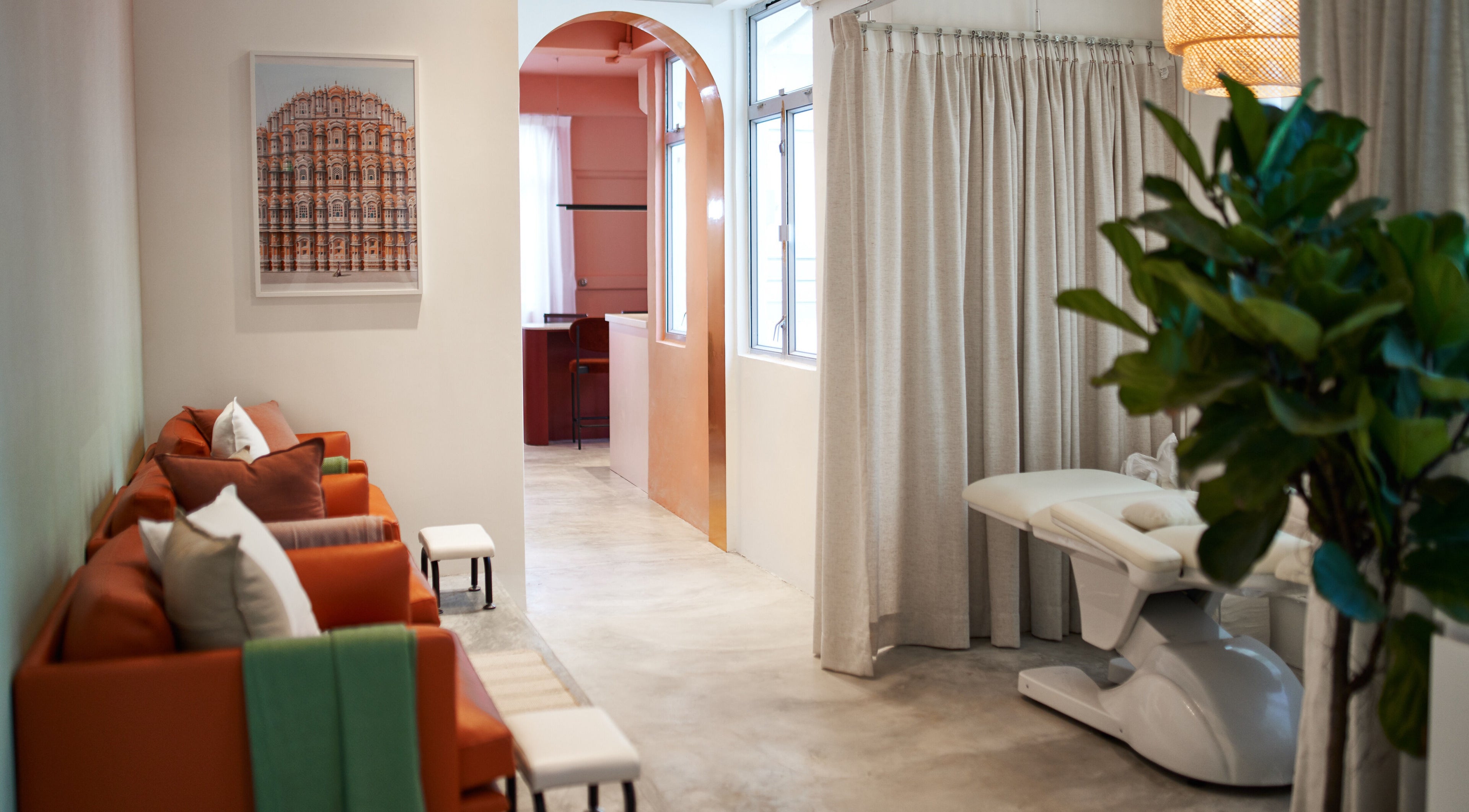 Relaxation area in Tinted. - Causeway Bay, Hong Kong Island, HK. Cozy seating and a massage table.