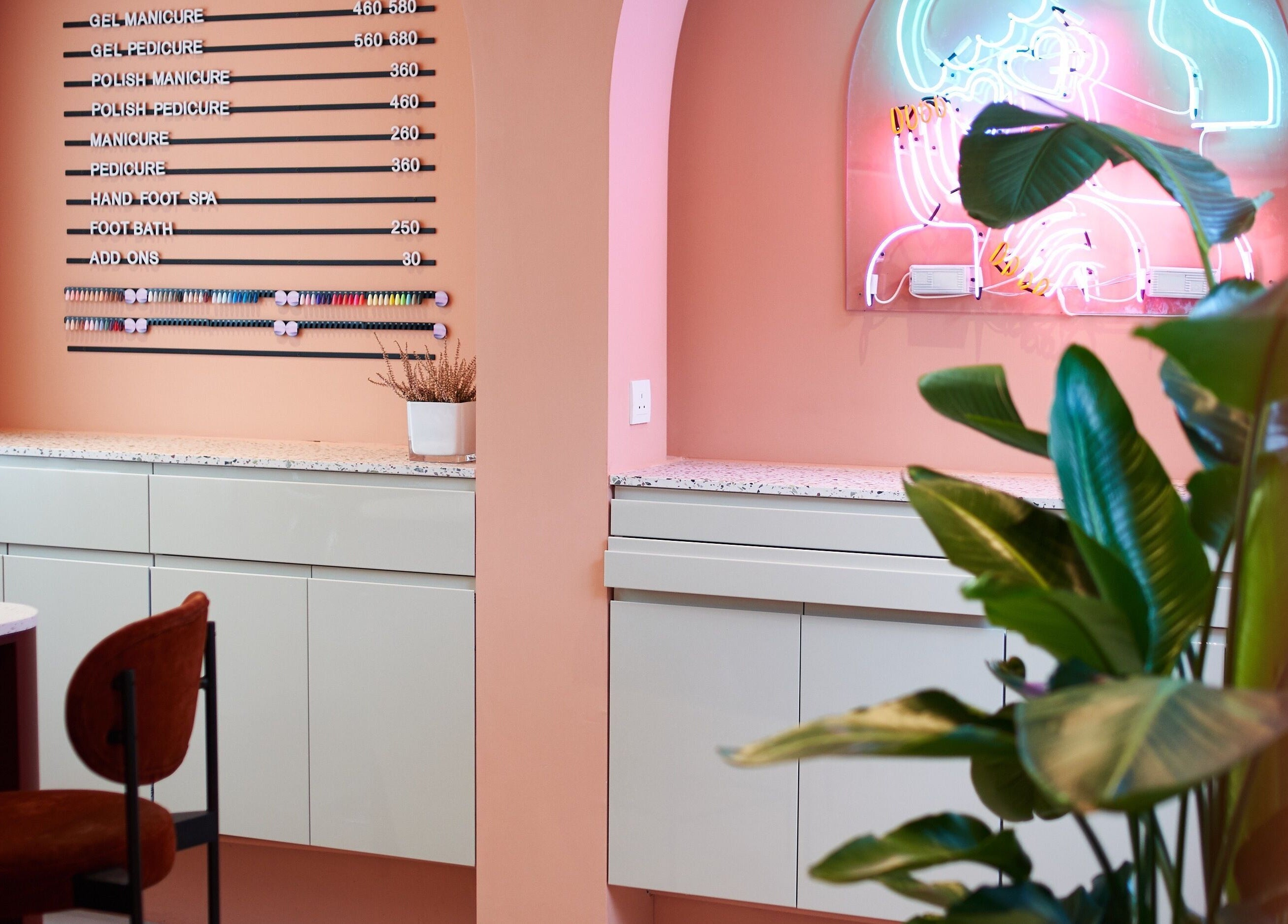Modern interior of Tinted. - Causeway Bay, Hong Kong Island, HK with neon lights and greenery.