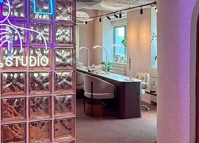 Chic interior of Tinted. Studio - Tsim Sha Tsui with neon art, glass blocks in Kowloon, Kowloon, HK.