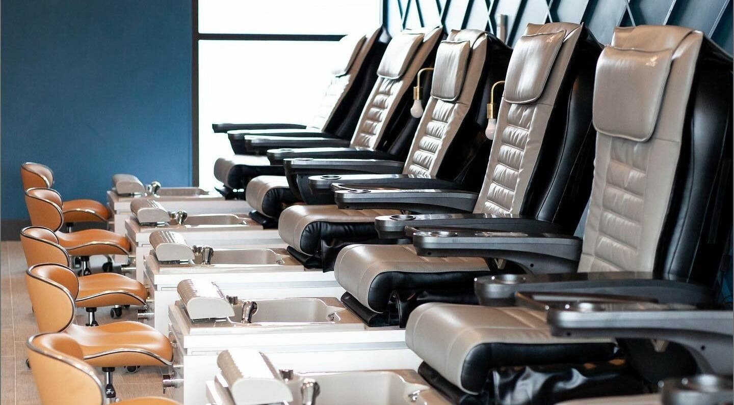 Elegant pedicure chairs at Nirvana Beauty Lounge in Reno, Nevada, US for a relaxing wellness experience.
