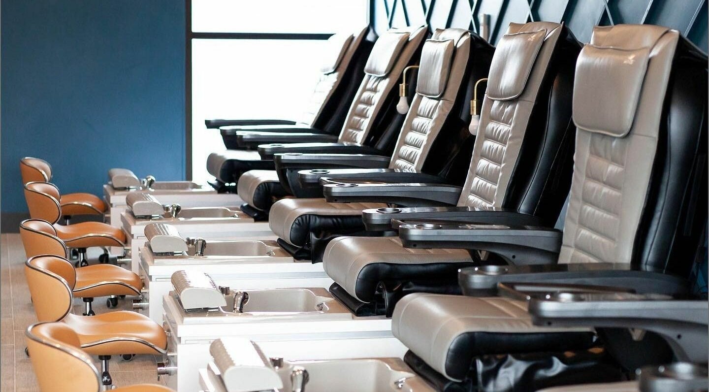Elegant pedicure chairs at Nirvana Beauty Lounge in Reno, Nevada, US for a relaxing wellness experience.