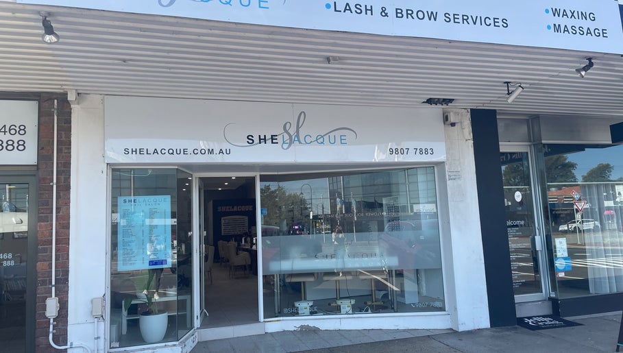 Street view of SheLacque, a beauty venue in Melbourne, Victoria, AU, showcasing its modern storefront design.