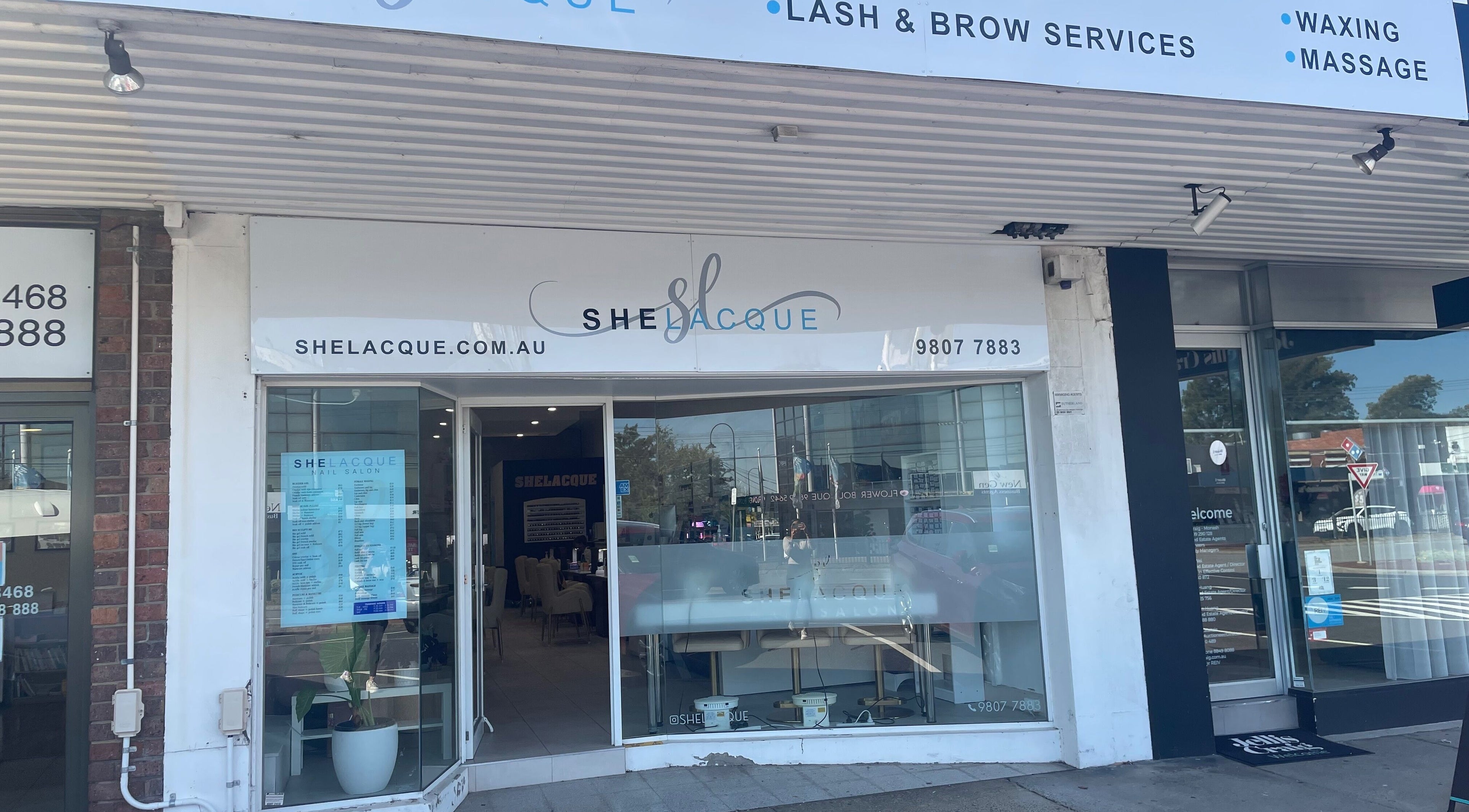 Street view of SheLacque, a beauty venue in Melbourne, Victoria, AU, showcasing its modern storefront design.