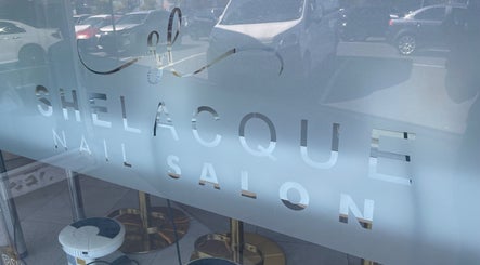 SheLacque Nail Salon entrance in Melbourne, Victoria, AU with stylish signage.