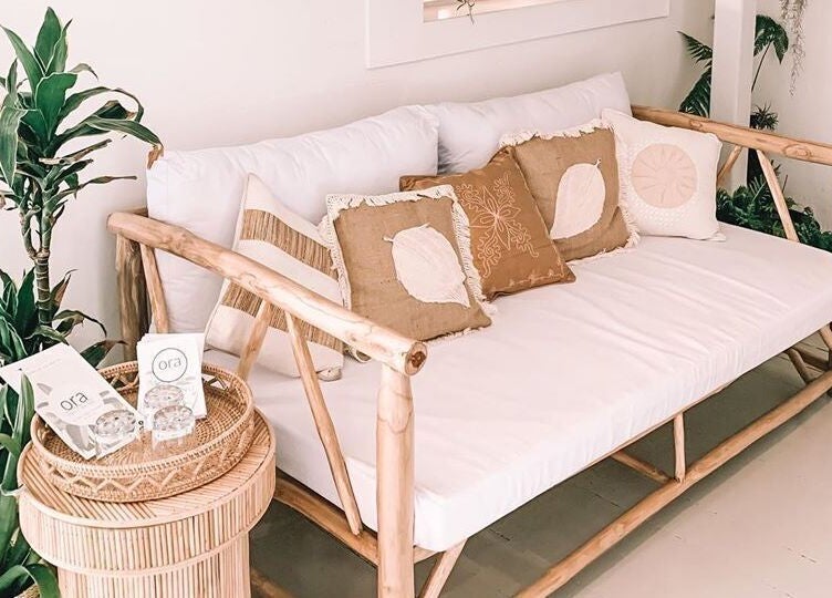 Relaxing bamboo sofa area at Oura Day Spa, Gisborne, Gisborne, NZ. Enjoy serene comfort with natural decor.