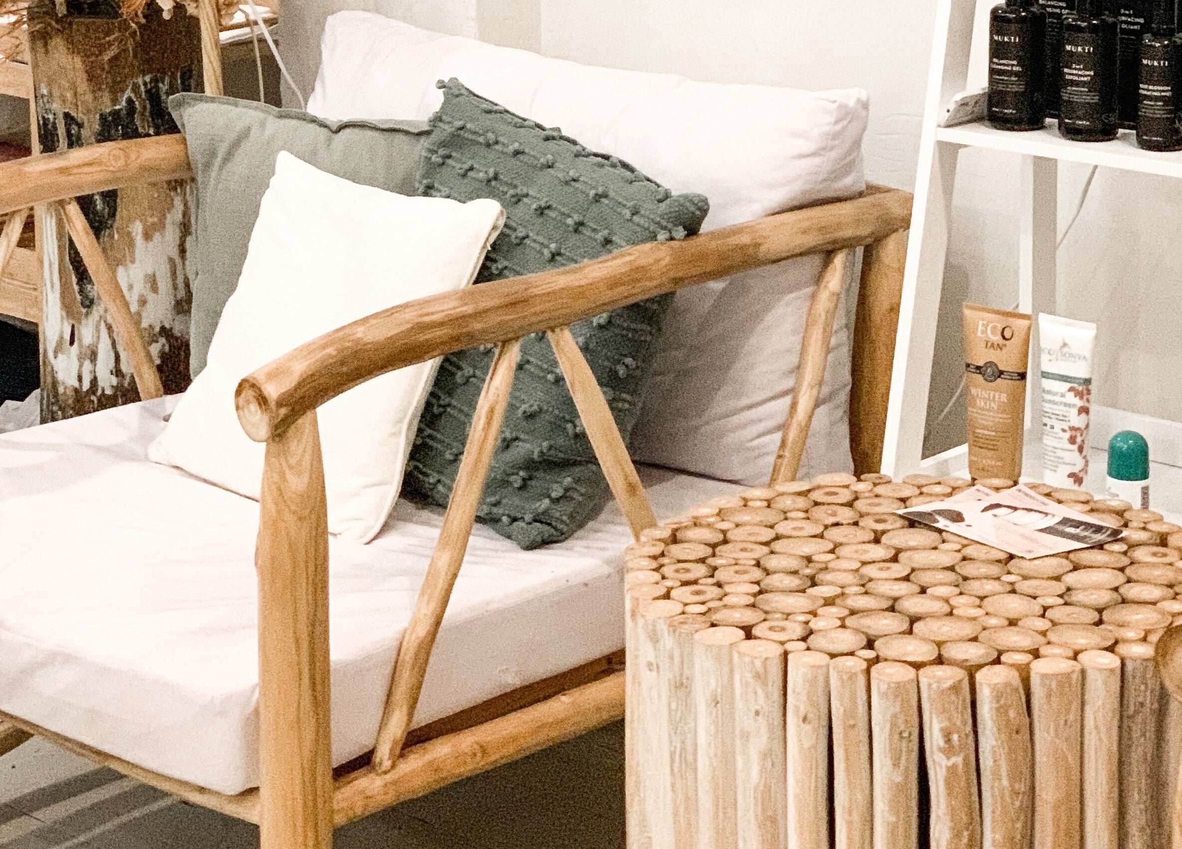 Cozy wooden seating area at Oura Day Spa, Gisborne, NZ, highlighting natural decor and serene ambiance.