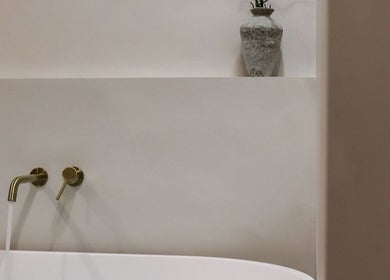 Elegant bathroom at Recovery by Oura, Gisborne, NZ showcasing minimalist design with soothing beige tones.