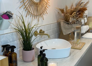 Elegant washroom setup at Beauty + Wellness by Faye Jervis, Sheffield, England, GB with natural decor and soothing accents.