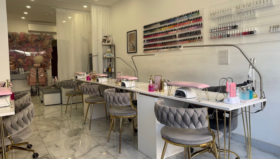 Modern nail salon interior at Aurae London - Nail Artistry & Beauty, Romford, England, GB with stylish decor.