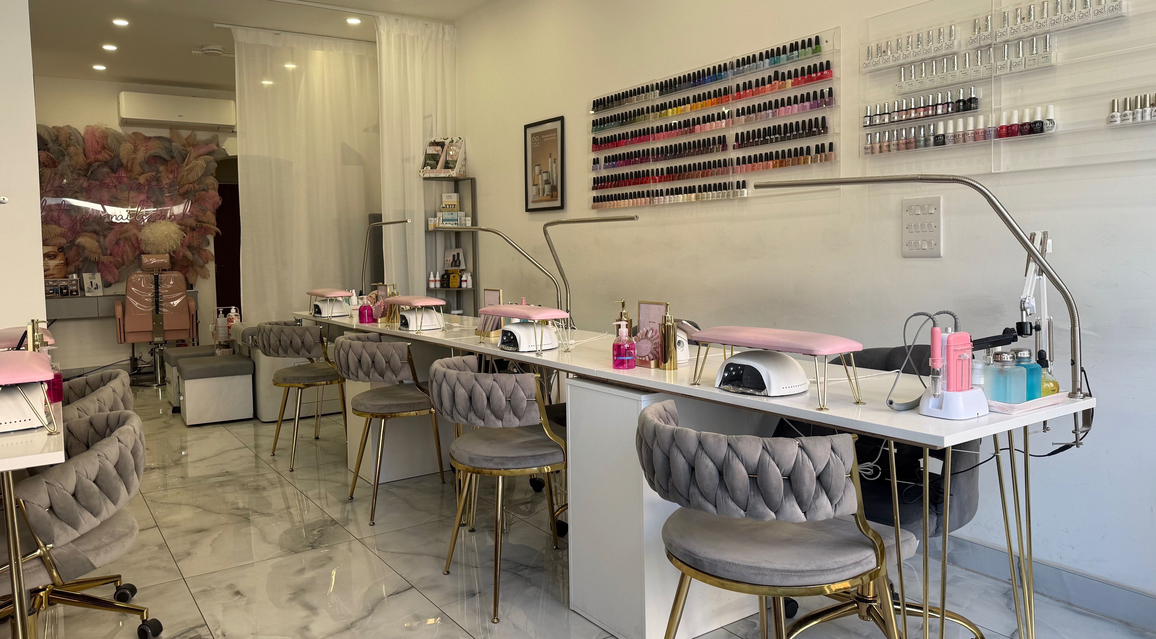 Modern nail salon interior at Aurae London - Nail Artistry & Beauty, Romford, England, GB with stylish decor.