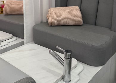 Luxurious pedicure station at Aurae London - Nail Artistry & Beauty in Romford, England, GB. Comfort meets elegance.