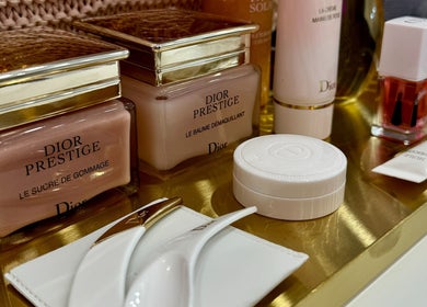 Dior Prestige beauty items on a tray at Aurae London - Nail Artistry & Beauty, Romford, England, GB.
